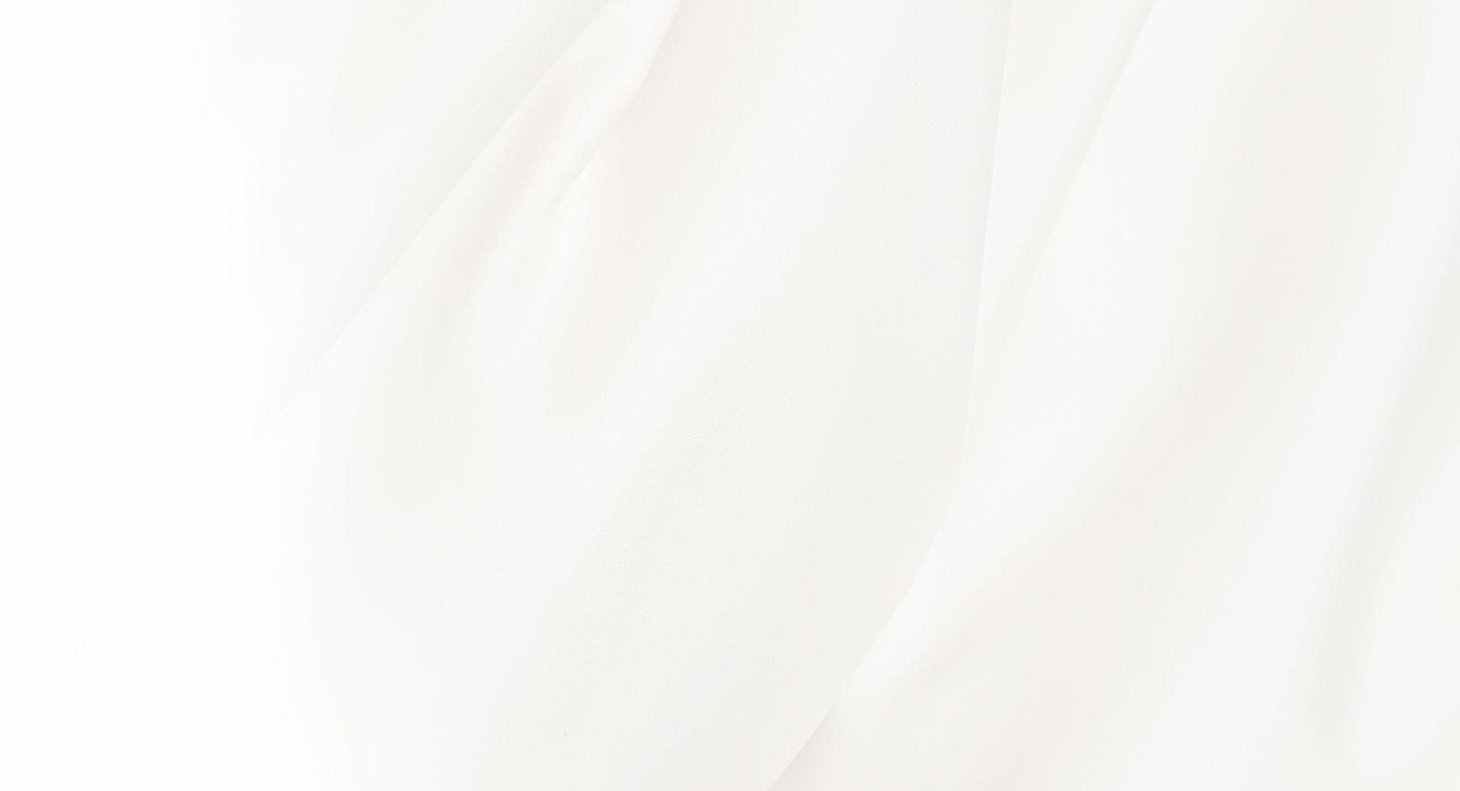 Close-up of smooth, white fabric texture.
